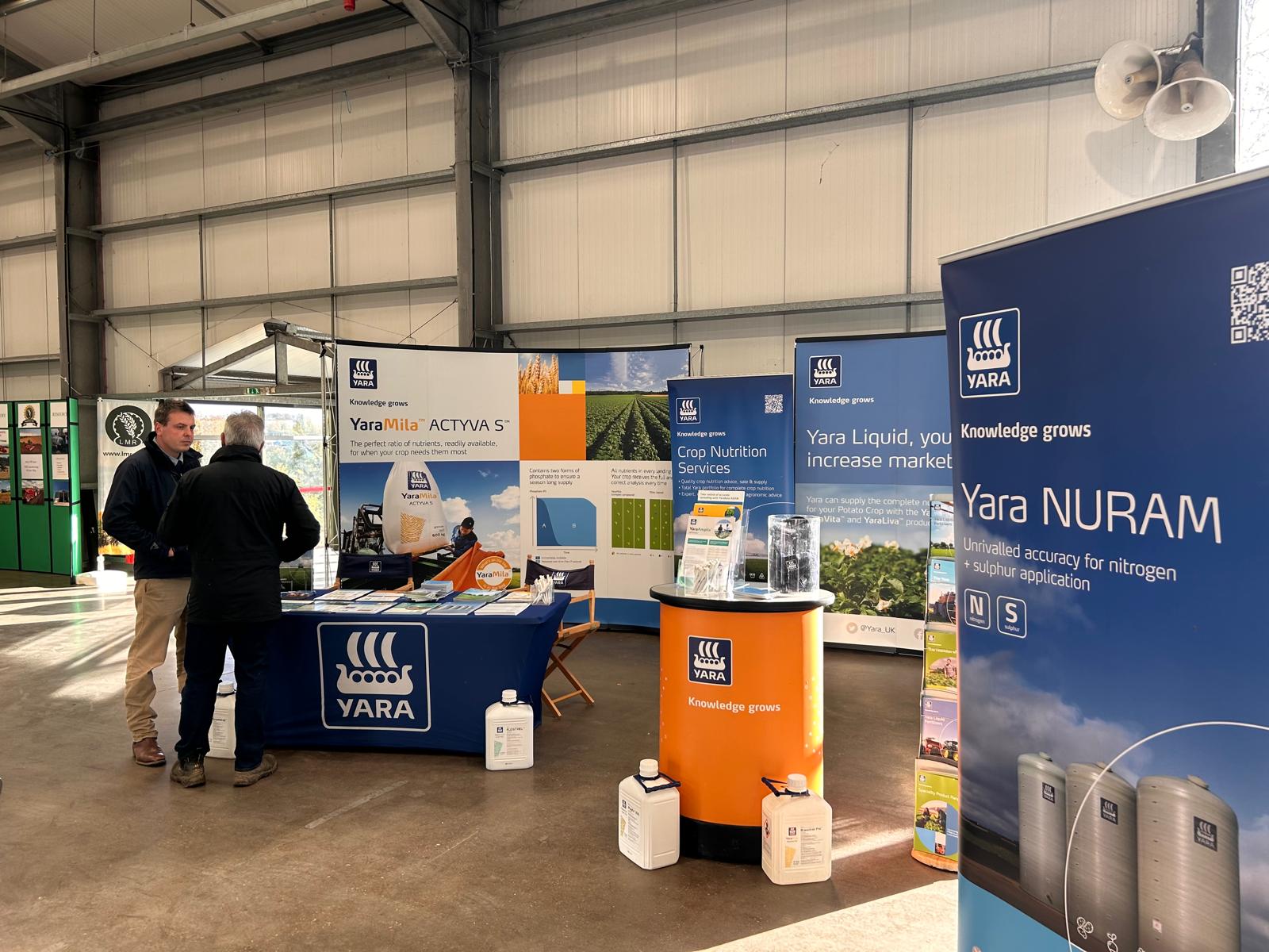 Yara Stand with Area Manager and Farmer