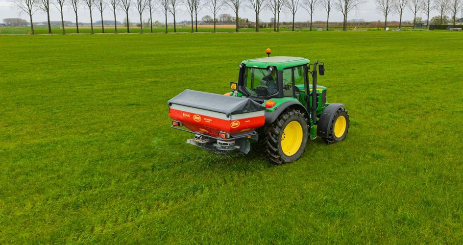 Spreader on a field